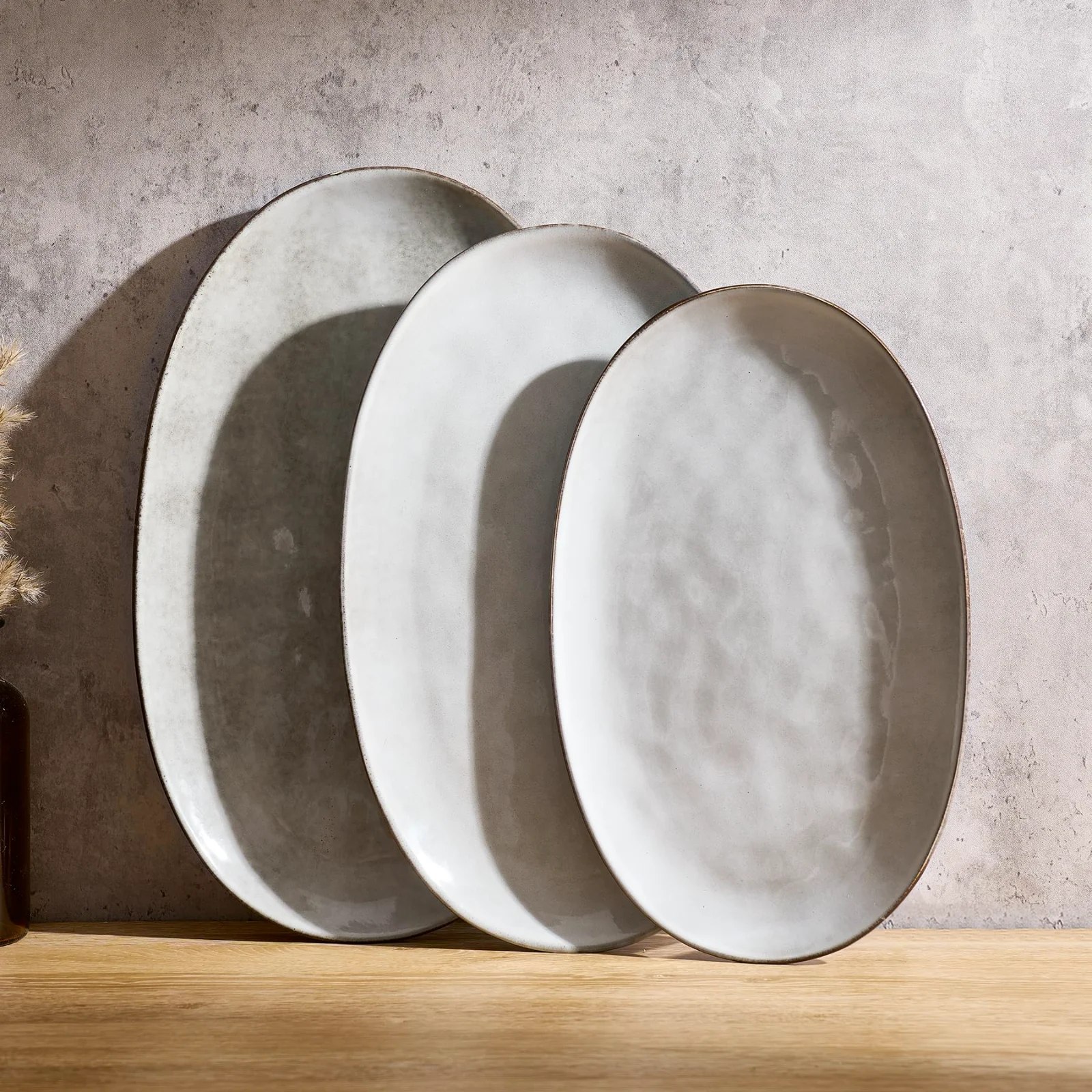 What a reactive glaze does in the kiln, and why your plates will not match